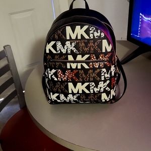 Pursue MK black and gold